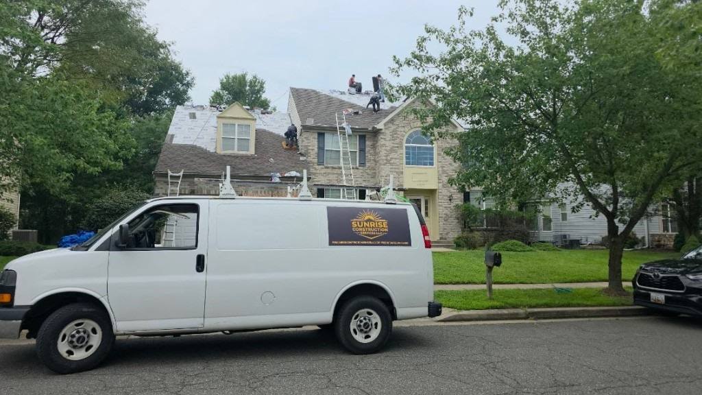Mike and the Sunrise Construction crew replacing a roof in Laurel, MD