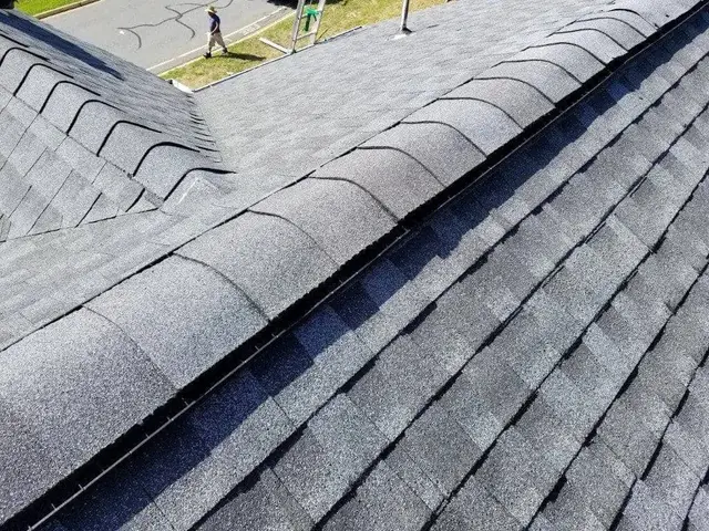 Close-up of architectural shingle hip and ridge installation on a Laurel, MD roof